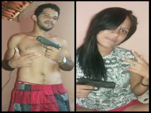 casal membro da quadrilha ostentando as armas