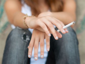 Mulher fumante: perigo