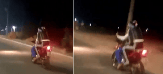 Motoqueiro carrega boneca na garupa de moto