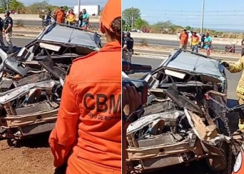 Motorista perde controle de carro, bate em caminhão e fica preso às ferragens