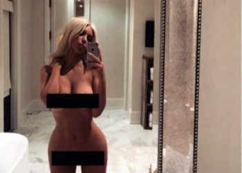 Três meses depois de dar à luz, Kim Kardashian posta foto nua