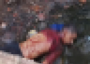 Corpo de adolescente é encontrado em grota com símbolo de facção nas costas