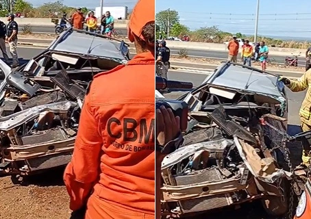 Motorista de Fiat Strada fica preso às ferragens após colidir com caminhão
