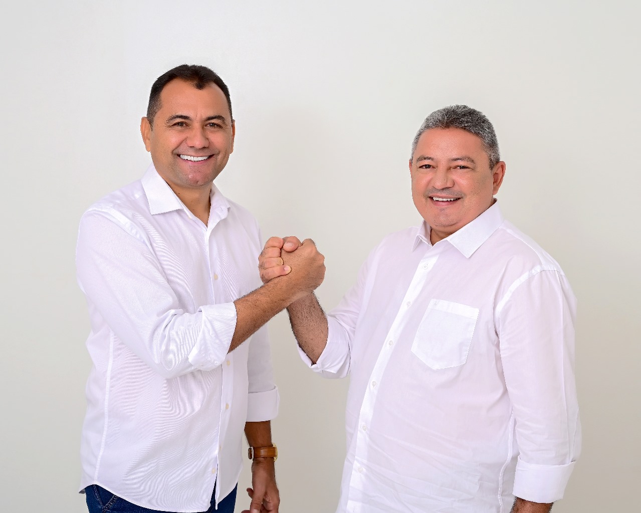 Carlinhos Reis à esquerda e pré-candidato a vice Nilmar Barbosa à direita