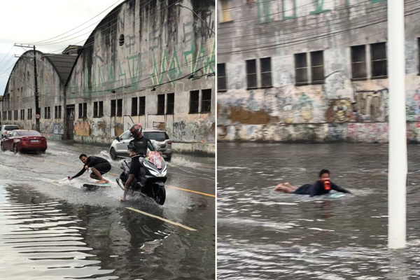 Homem surfa em ruas alagadas de Salvador